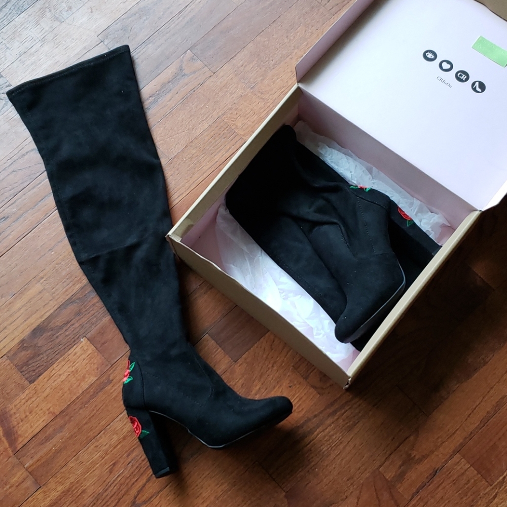 Knee high black suede boots